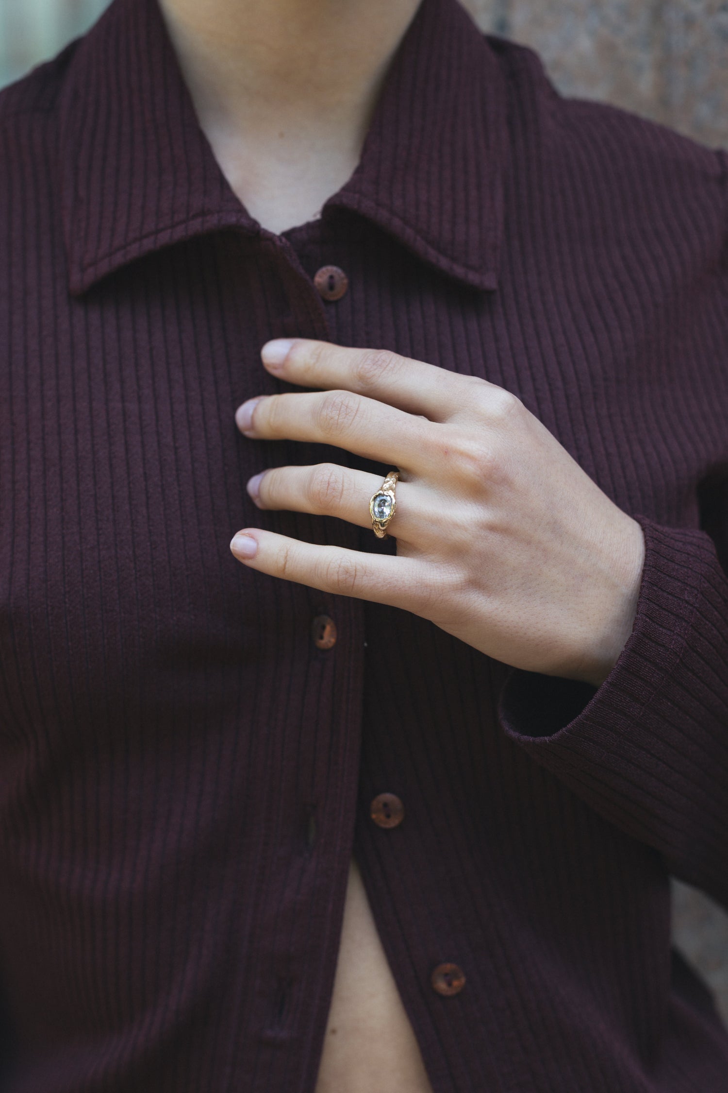 Nest Oval Maxi Ring worn on a hand, 18k gold engagement ring with an oval diamond