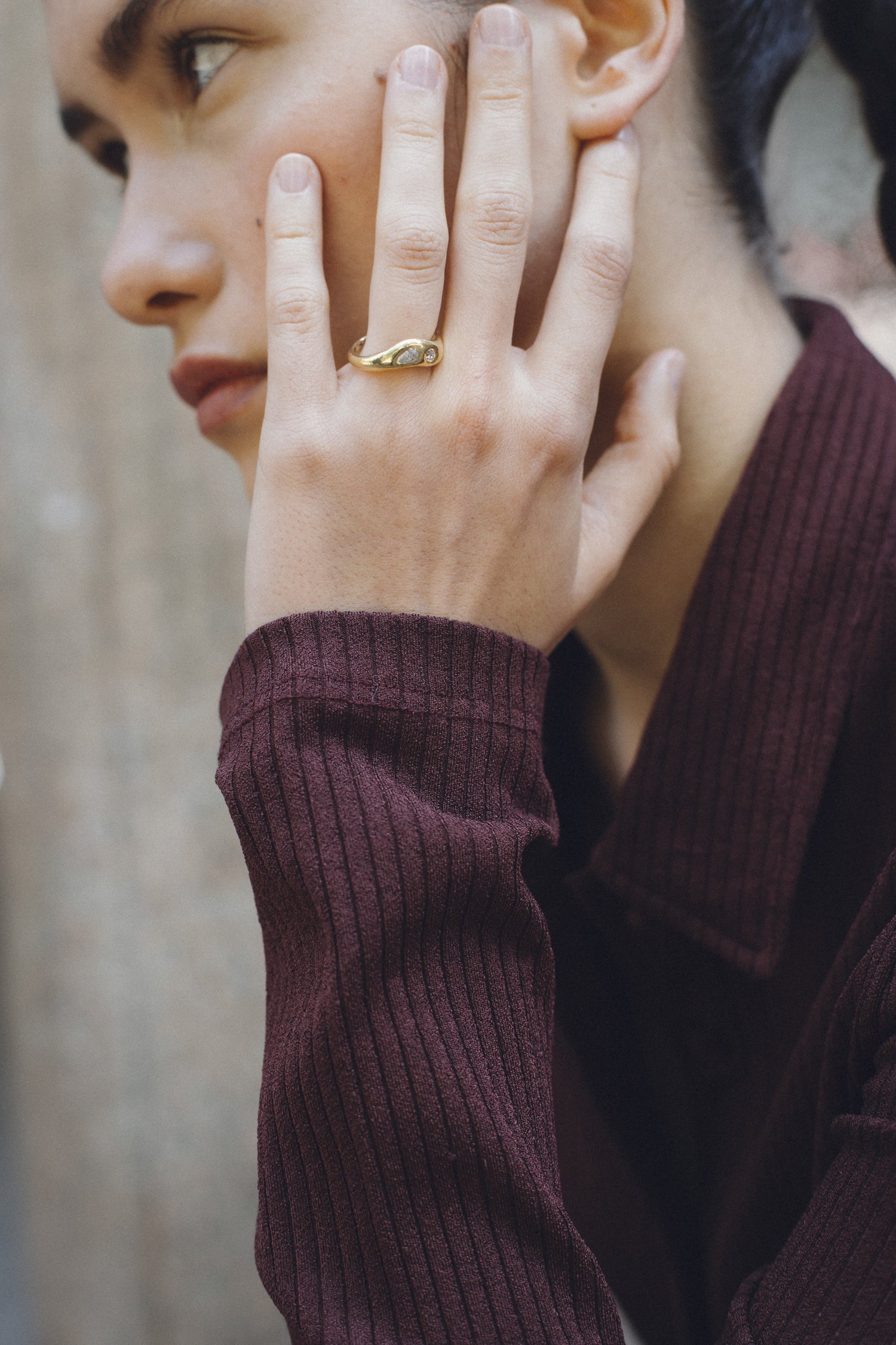 Orbit Duo Ring worn on a hand, 18k gold engagement ring with two diamonds