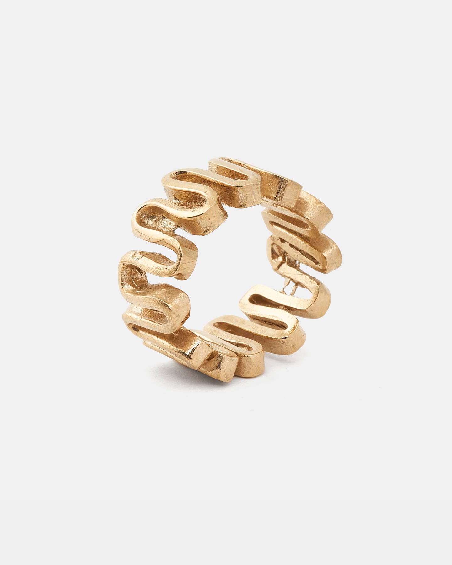 Gold Arpa ring with sculptural, wave-inspired surface