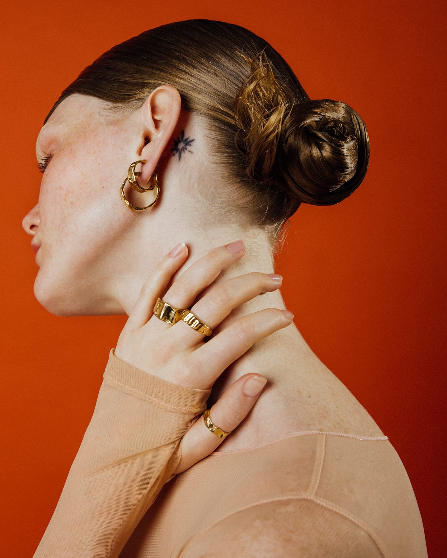 LMJ hand-sculpted Aura Ring Mini silver and gold worn in a editorial style