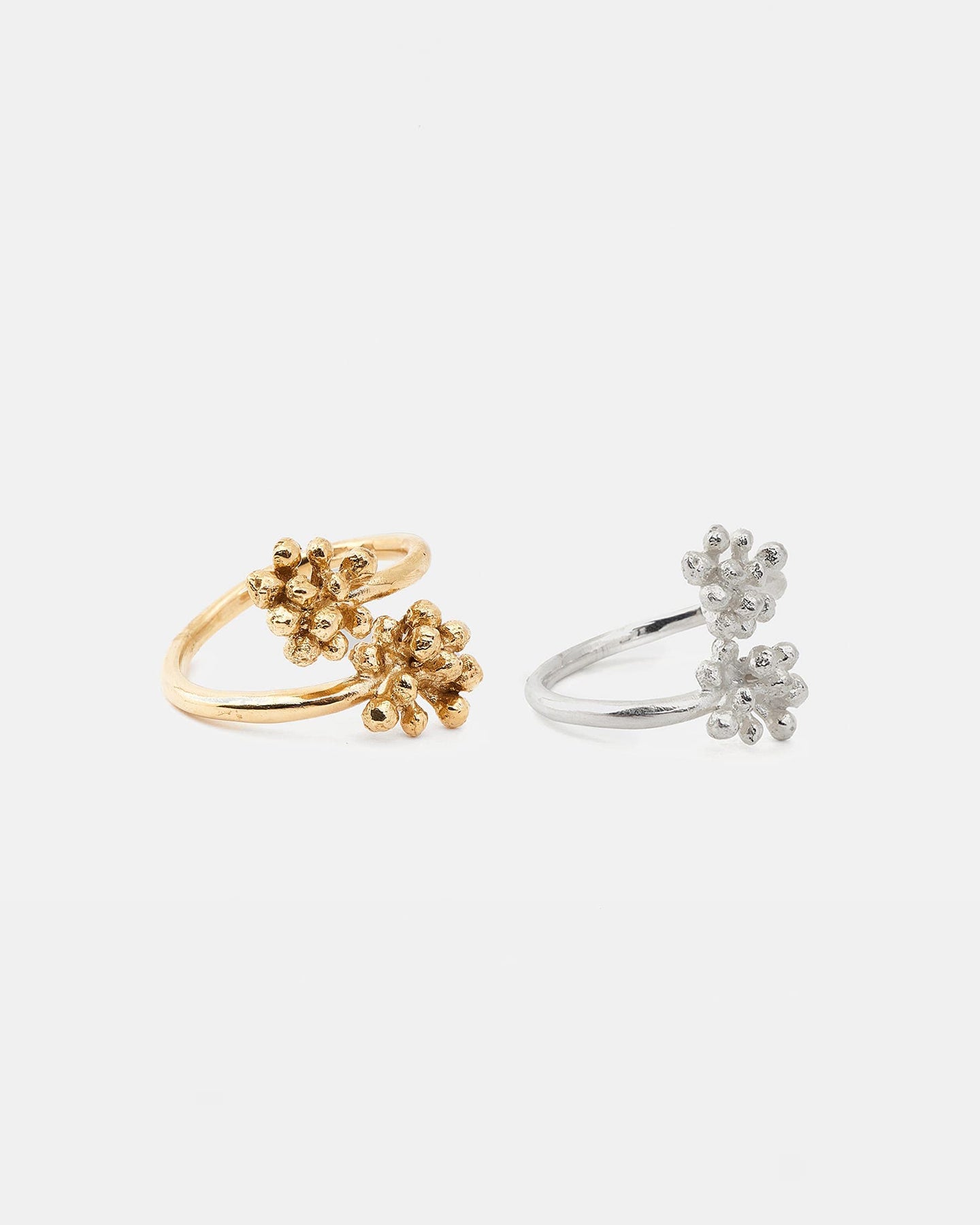 LMJ Bouquet Rings in gold and silver displayed side by side