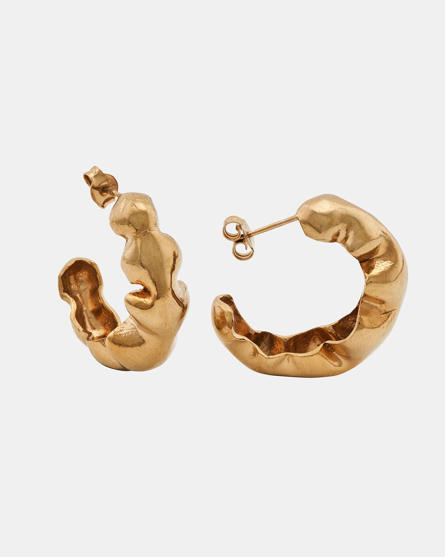 Angled view of LMJ Bubble Maxi Earrings in gold with sculptural textures.