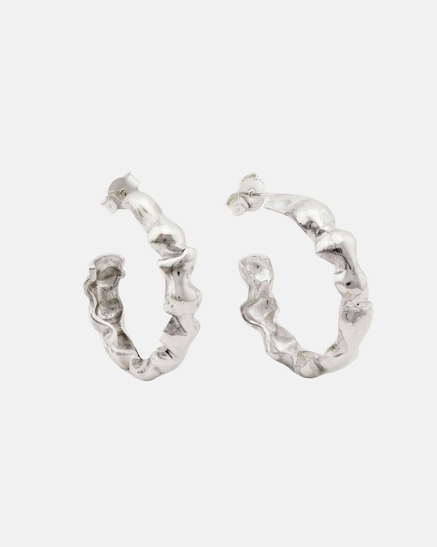 LMJ Bubble Mini earrings in gold, cast in flowing molten-like shapes with sculptural movement.