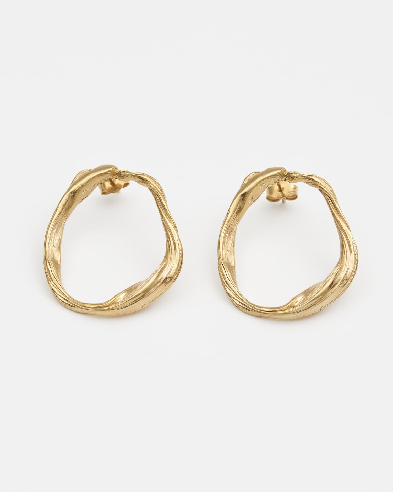 LMJ Curl Earrings in gold – architectural hoops inspired by organic lines