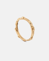 Gold drop ring with organic details, horizontal front view.
