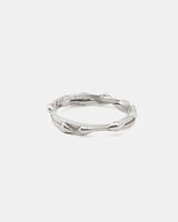 Silver drop ring with organic details, horizontal front view.