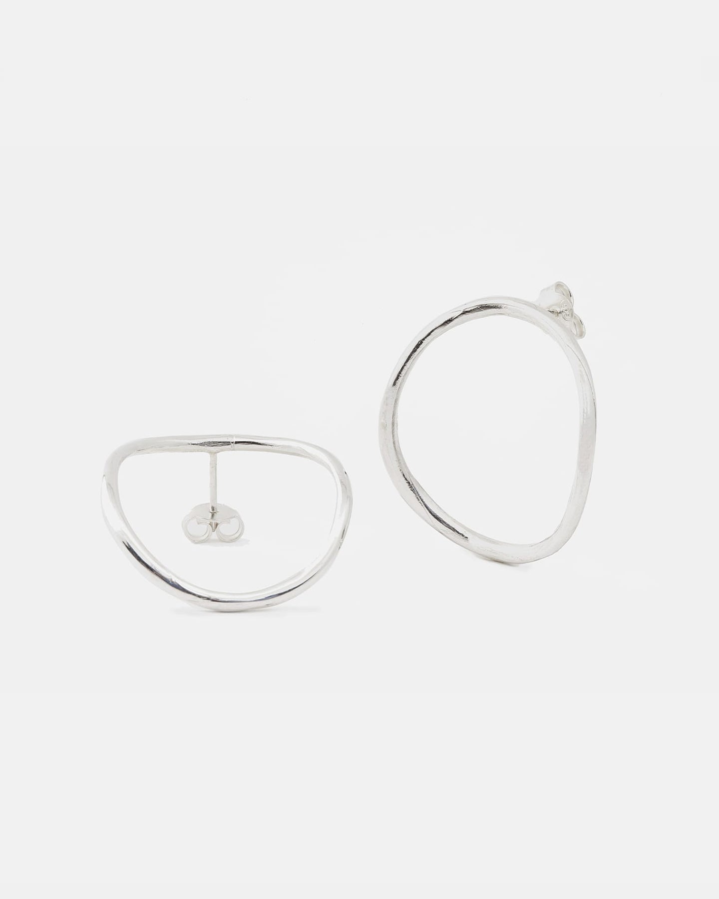 LMJ handmade Hollow Earrings - silver hoop earrings on a white background