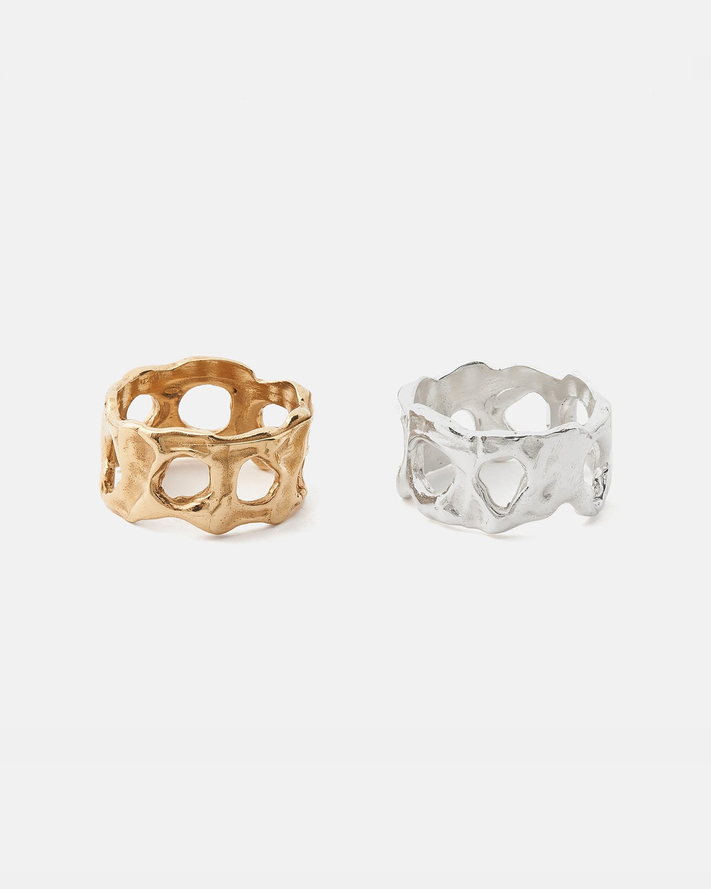 LMJ Gold and silver Nebula handmade rings with a organic design on a white background