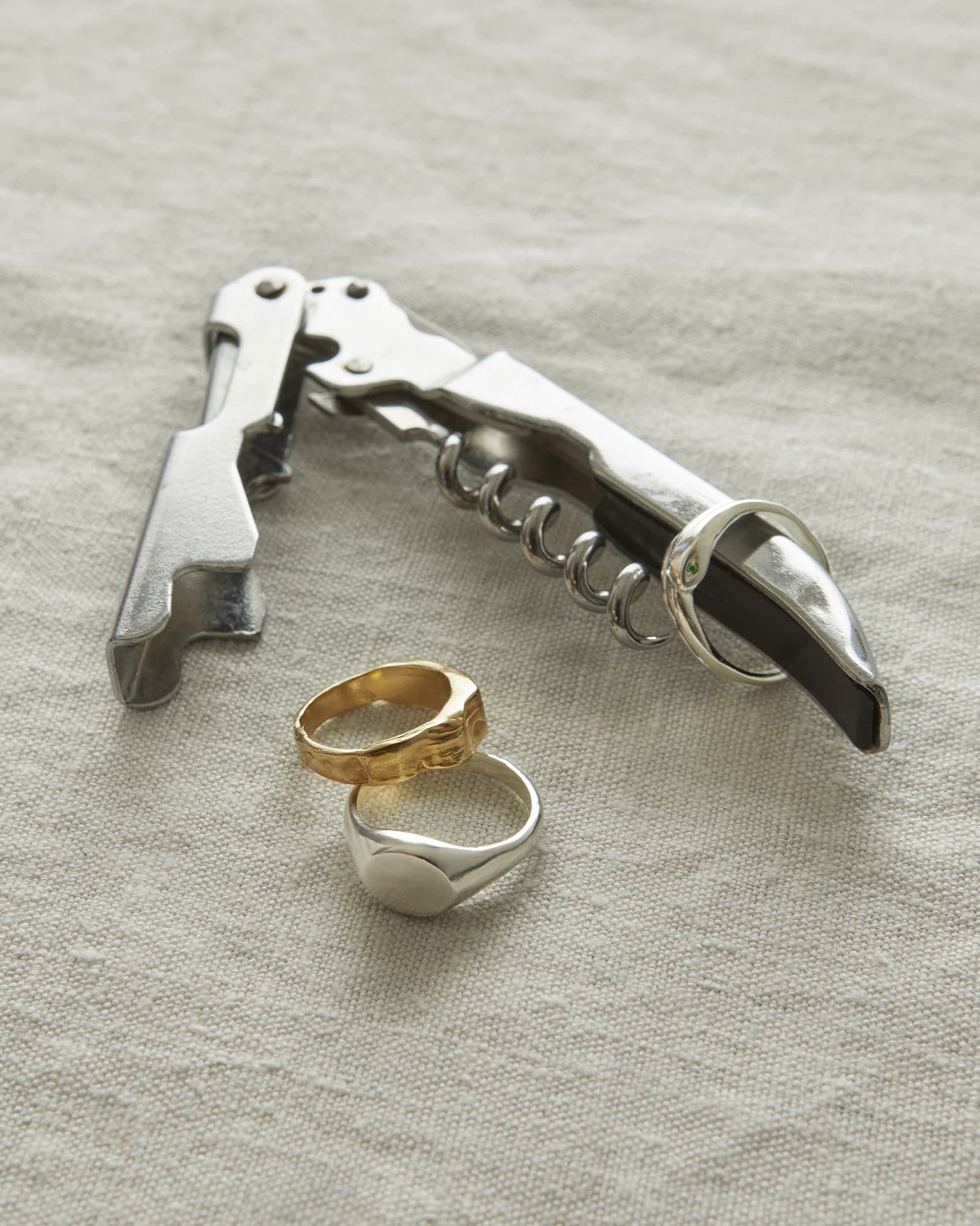 LMJ Oval Signet Ring in silver on a book