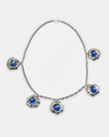 LMJ Puff Necklace in silver with blue enamel charms, laid flat