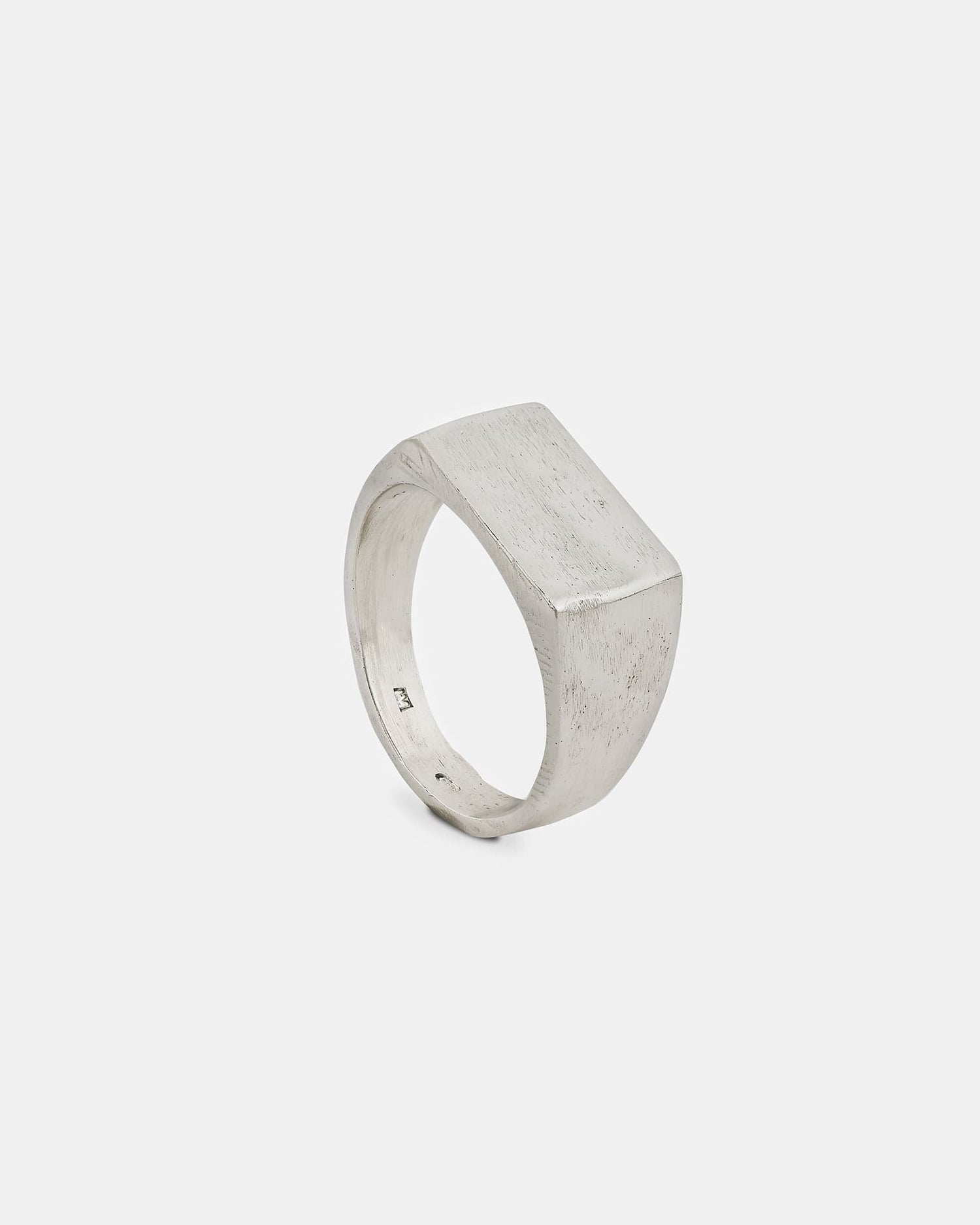 LMJ Silver ring with a geometric design on a white background