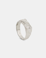 LMJ Silver ring with a textured design on a white background
